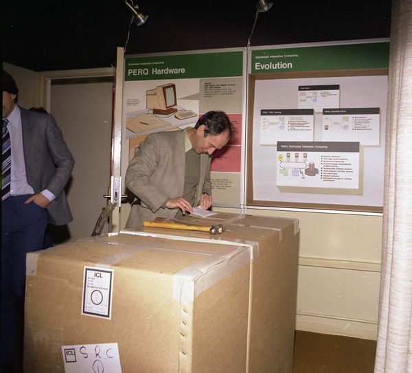 First ICL Fabricated PERQ (SRC 1 on Case). Geoff Manning checks the label